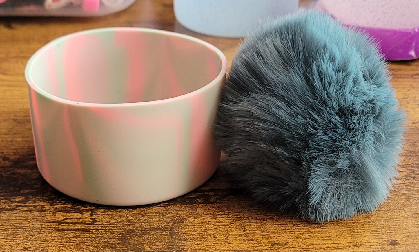 Silicone bottoms with pom poms for cups