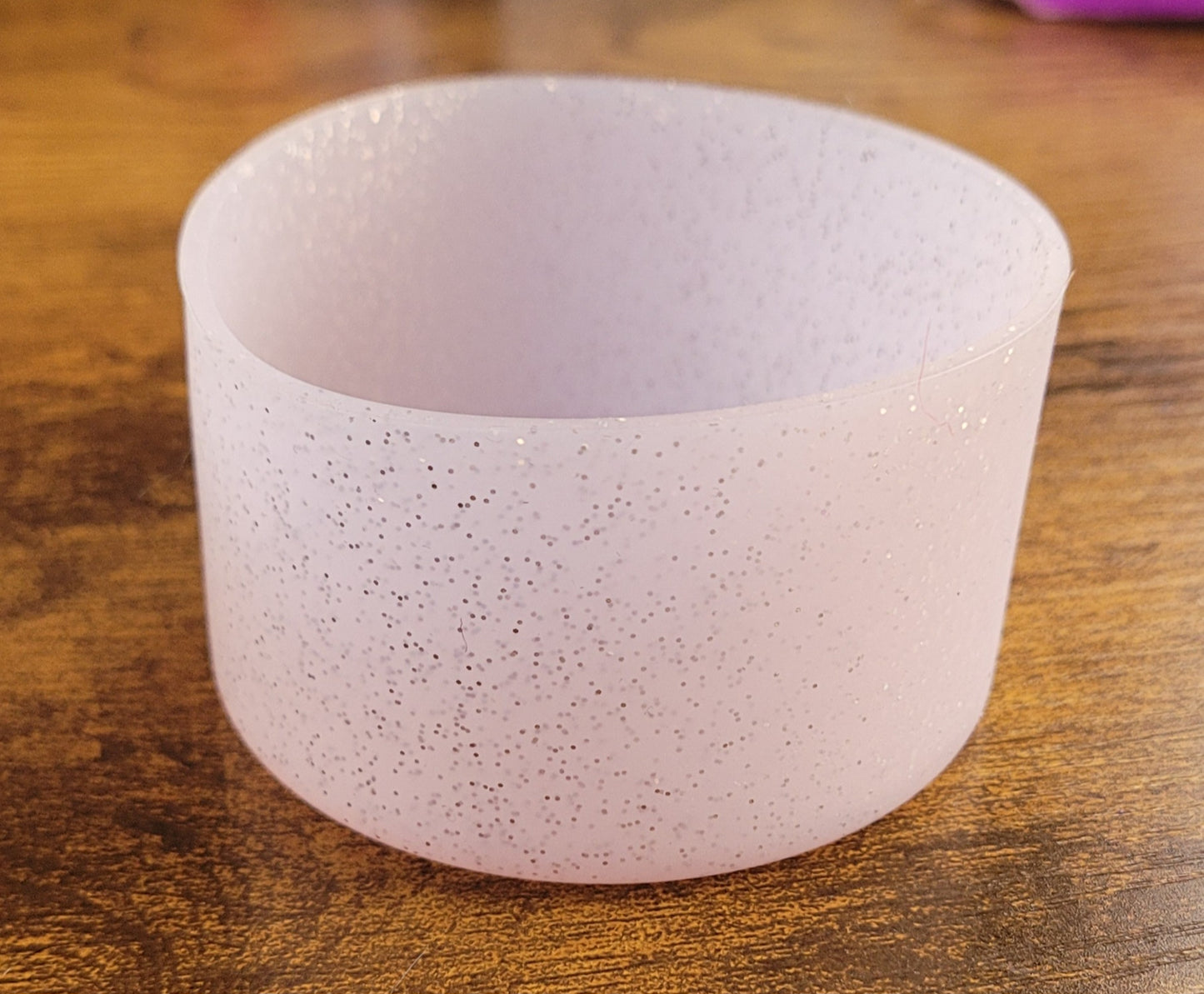 Silicone bottoms with pom poms for cups