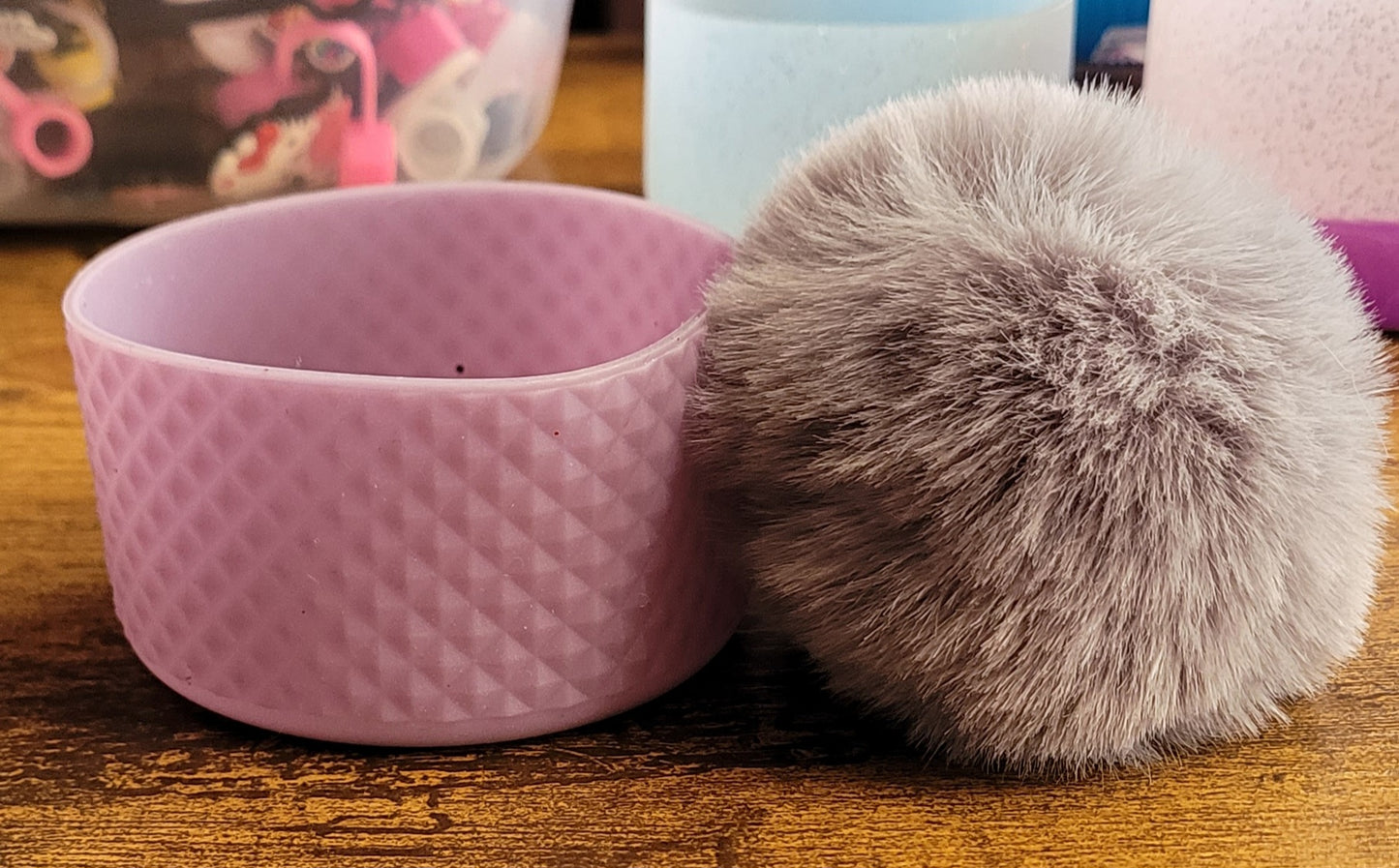 Silicone bottoms with pom poms for cups
